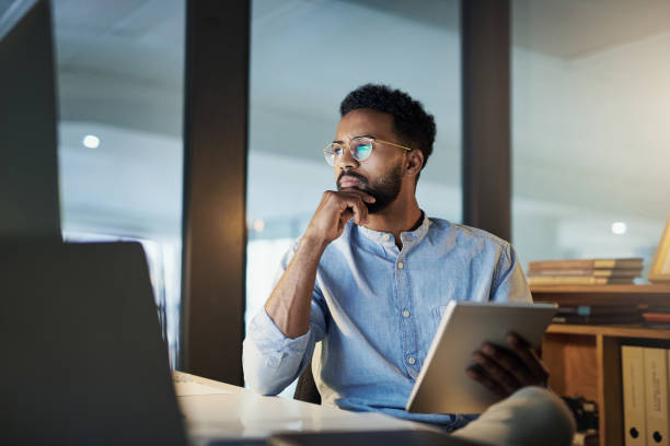 Man in office using CRM